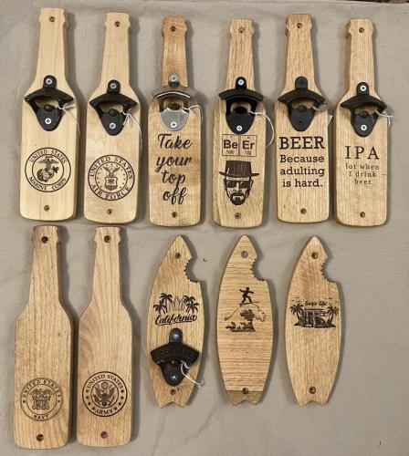 Wall-mounted bottle openers